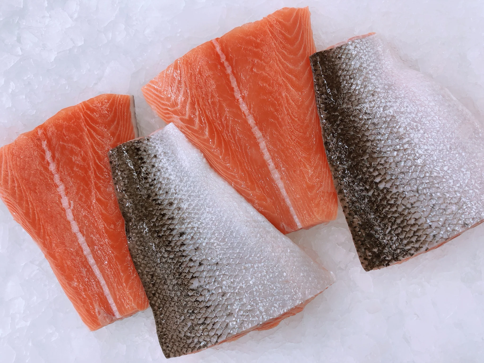 HUON BONELESS SALMON TAILS (MIN 500G)